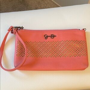 Jessica Simpson Pink Wristlet with Intricate Cutout